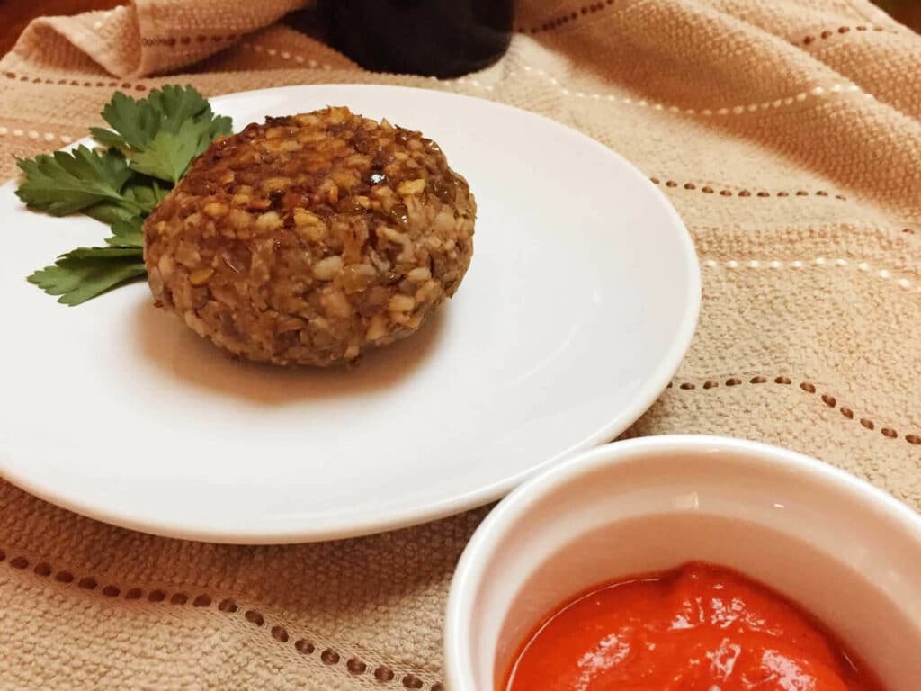Lentil Patty with Tomato-Red Pepper Sauce